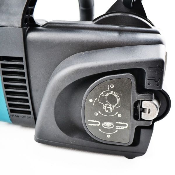 Електропила Makita UC4051A (MAKITA) 2000W з безключовим натягуванням ланцюга. Електрична пила Макіта UC4051A фото
