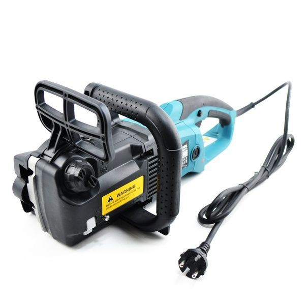 Електропила Makita UC4051A (MAKITA) 2000W з безключовим натягуванням ланцюга. Електрична пила Макіта UC4051A фото